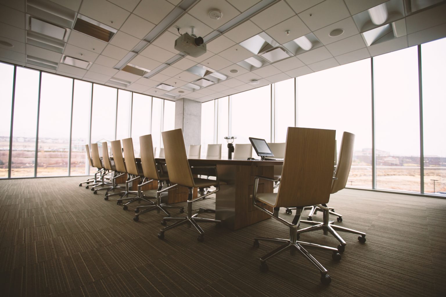 Chairs in a Meeting Room, and yet there is a sense of an Underlying Message...